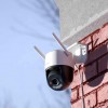 Vaizdo stebėjimo kamera IMOU Cruiser SC WiFi 5MP sumontuota ant namo sienos
